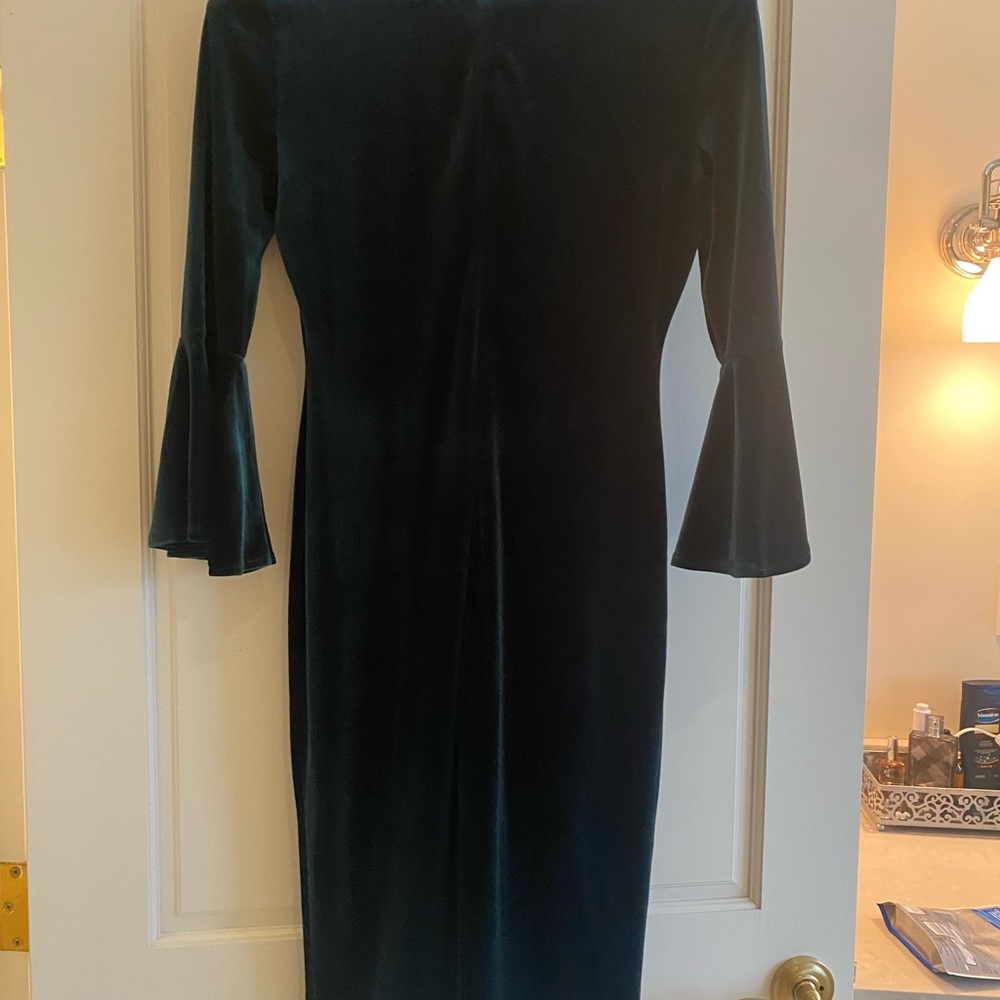 Deep emerald green velvet dress